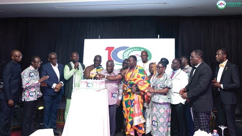 Dr David Nkansa-Dwamena (6th from left), Board Chairman of Korle Bu Teaching Hospital, cutting a cake to launch the project. With him are some dignitaries