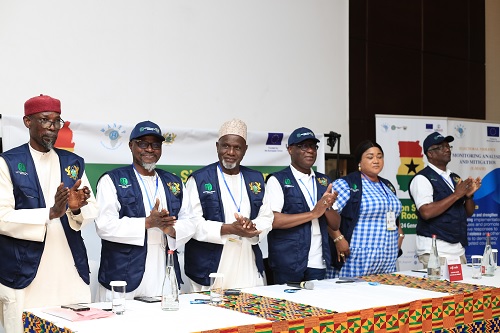 Dr Ernest Adu Gyamfi (3rd from right), Chairman, National Peace Council, applauding after the observation of the 2024 elections. With him are members of the Council. Picture: BENEDICT OBUOBI 