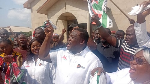  Samuel Nartey George flanked by Vera George (left), his wife, and Gladys George (right), his mother, and supporters of the NDC after he was declared winner