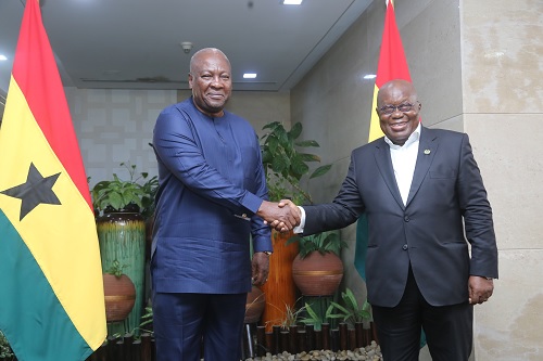 President Akufo-Addo in a handshake with John Dramani Mahama (left), the President-elect, after the meeting at the Jubilee House. Picture: SAMUEL TEI ADANO
