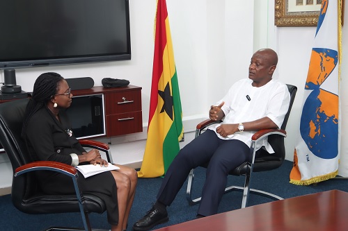 Togbe Afede XIV, Agbogbomefia of the Asogli State and President of Asogli Traditional Area, explaining a point to Augustina Tawiah (left), our staff writer. Picture: ELVIS NII NOI DOWUONA