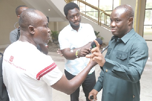 Felix Kwakye Ofosu (right), Spokesperson for the NDC on the Transition Team, speaking to the media during a meeting at the Accra International Conference Centre. Picture: SAMUEL TEI ADANO