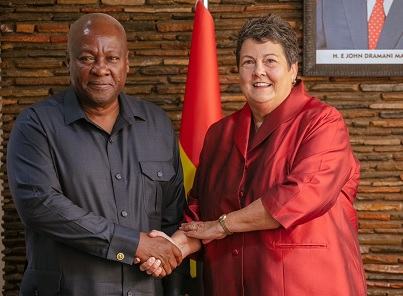 John Mahama, President-elect, in a handshake with Virginia E. Palmer,  US Ambassador to Ghana, after the meeting