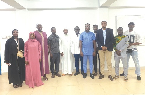 Gamel Abdul-Nasser Salifu (4th from right), patron of the association, with some members and guests at the event