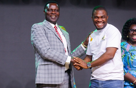  Dr Yaw Osei Adutwum (left), Minister of Education, in a shake with Dr Eric Nkansah (right), Director-General of GES. Picture: CALEB VANDERPUYE