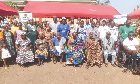  Togbe Dzegblade IV (seated 4th from left), Chief of Adaklu-Kodzobi, and some of the resource persons and persons living with NCDs