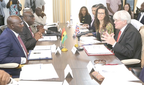 Andrew Mitchell (right), Minister of State for Development and Africa, explaining a point to Dr Mahamudu Bawumia (1st left), at the Jubilee House during the bilateral talks. Picture: SAMUEL TEI ADANO