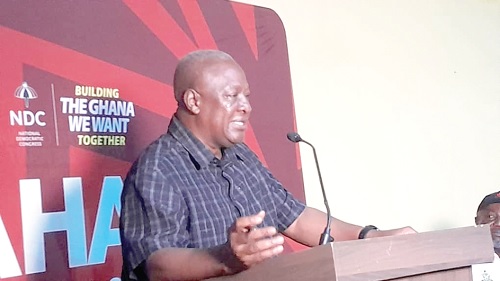 John Dramani Mahama (left), NDC flag bearer, addressing professional association in Koforidua