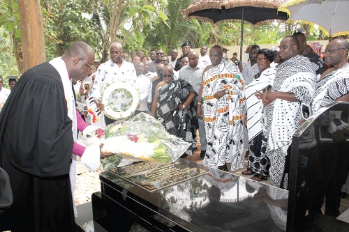 Rev. Dr Abraham N. O. Kwakye (left), Moderator of the General Assembly of the Presbyterian Church of Ghana, laying a wreath on behalf of the Okyenhene on the tomb of Dr J. B. Danquah. With him are President Akufo-Addo (arrowed); Amoatia Ofori Panin (4th from  right), the Okyenhene; Nana Adutwumwaa Dokua (3rd from right), and Ken Ofori-Atta (right), Minister of Finance