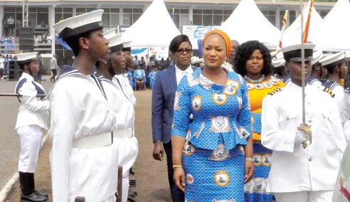 Samira Bawumia (middle) inspecting a guard of honour mounted by the Navy cadet corps of  OLA SHS in Ho