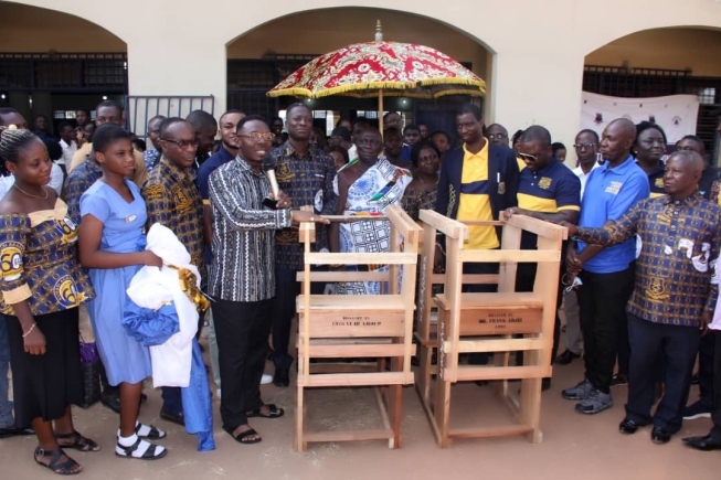 Old students of KUMACA support alma mater with 1000 desks