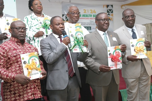 Dr Patrick Kuma-Aboagye (2nd from left), Director-General, Ghana Health Service, launching the initiative in Accra. With him are Prof. Kwesi Torpey (right), Dean, University of Ghana School of Public Health; Dr Francis Chisaka Kasolo (2nd from right), Country Representative, WHO; Dr Sefa Sarpong Bediako (left), Council Chairman, GHS, with other guests. Picture: SAMUEL TEI ADANO