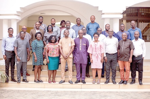 Dr Kwame Adjei-Mantey (Front: 4th from left), economist and lecturer at the University of Environment and Sustainable Development, Somanya, with some of the participants in the research and policy engagements workshop at the  University of Ghana, Legon. Picture: CALEB VANDERPUYE