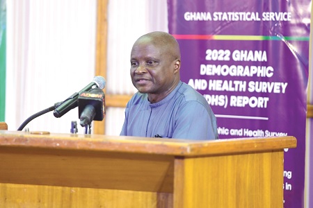 Odei Gyebi, acting Director, Demography, Ghana Statistical Service, making a presentation on household water and sanitation