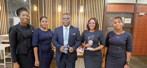The Accra City Hotel team with the awards