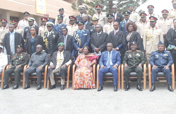 Akosua Frema Osei-Opare (middle), Chief of Staff, Office of the President; Dominic Nitiwul (3rd from right), Minister of Defence, and Major  General Irvine Nii-Ayitey Aryeetey (3rd from left), Commandant, National College of Defence Studies, with some participants in the course at Burma Camp in Accra. Picture: ESTHER ADJORKOR ADJEI