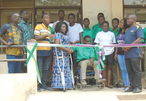 Inset: Dr Augustina Naami (4th from left), joined by some students and staff of the Ghanata SHS, to cut the tape to inaugurate the ramps (main picture) provided for persons with mobility disability in the school