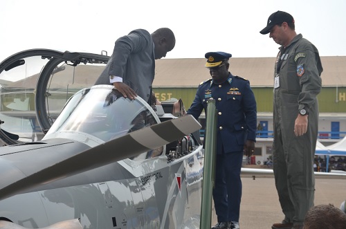 Dominic Nitiwul, Minister of Defence, disembarking from one of the A-29 Super Tucano Aircraft after a static and flight demonstration at the Airforce base in Accra 