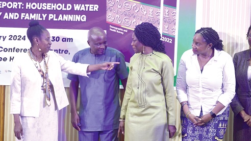 Dr Faustina Frempong-Ainguah (3rd from left), Deputy Government Statistician, interacting with  Dr Grace Bediako (left), Board Chair, Ghana Statistical Service,  Dr Adriana E.A. Biney (right), Regional Institute of Population Studies, UG,  and Odei Gyebi, acting. Director, Demography, Ghana Statistical Service, after the dissemination of the 2022 Ghana Demographic and Health Survey Report