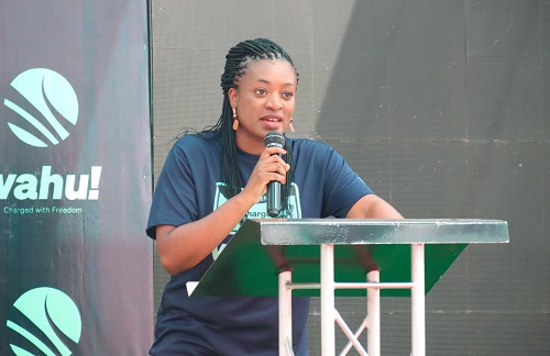 Valerie Larbi (left), CEO, Wahu Mobility, speaking at the launch.  Right: Some of the electric bikes on display. Picture: ELVIS NII NOI DOWUONA