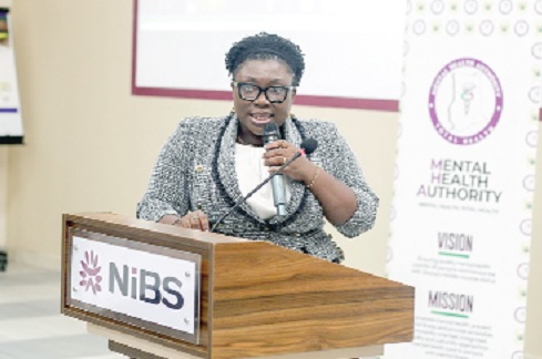 Some participants in the performance review session. INSET: Dr Adwoa Pinaman Appau, Chief Executive of the Mental Health Authority, speaking at the Mental Health Authority Annual Performance Review held at Nobel International Business School, Accra. Picture: CALEB VANDERPUYE 