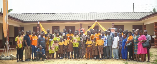 Some members of staff of Fidelity Bank staff, pupils, teachers and members of the community at the inauguration of the renovated school