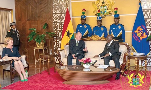 President Akufo-Addo in a hearty chat with Peter Ryan (left), Irish High Commissioner to Ghana