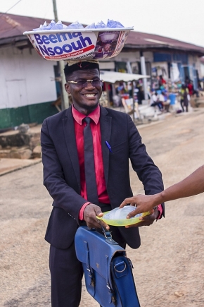 Ernest Antwi suits up to hawk pure water to fund education