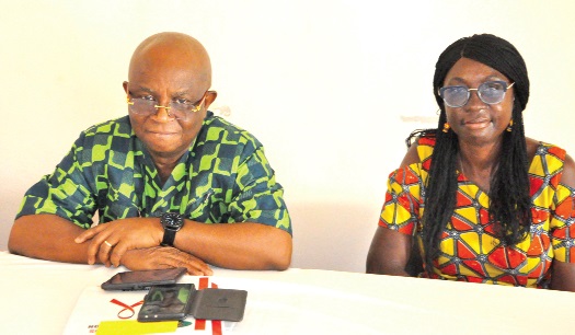Dr Archibald Yao Letsa (left), Volta Regional Minister, with Mary Naa Asheley Anyomi, Technical Coordinator of the Ghana AIDS Commission in the Volta Region
