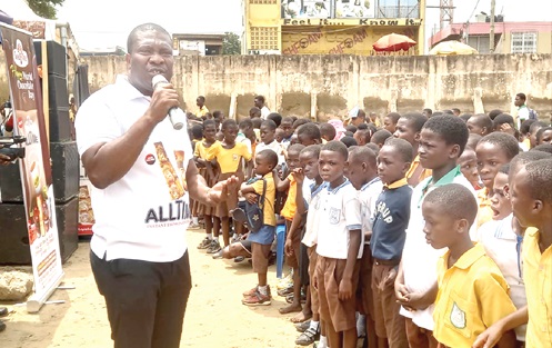 Nana Agyemang Ansong, Head of Sales and Marketing, Cocoa Processing Company, speaking to the learners about the health benefits of cocoa roducts