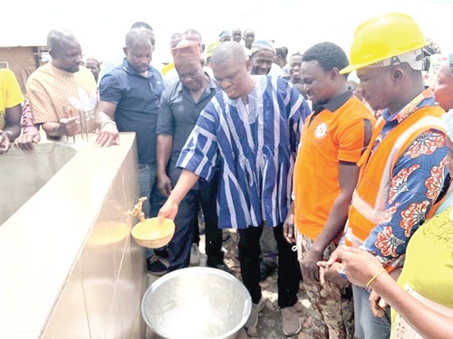  Mustapha Ussif, NPP  MP for the constituency, inaugurating a water system 
