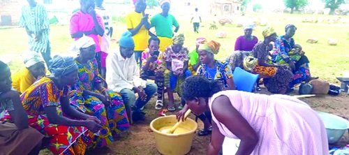 The affected persons being taken through the soap making process