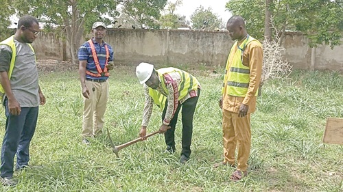 Professor Peter Osei Boamah, Pro-Vice Chancellor, digging the ground for the commencement of the project