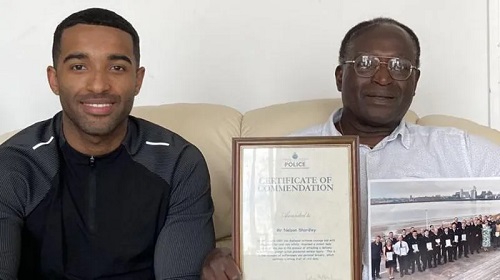 Nelson Shardey (r), seen here with his son Jacob, won a police commendation for bravery