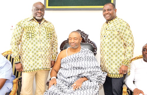 Nii Tackie Teiko Tsuru II (middle), Ga Mantse, with Kofi Adomako (left), Managing Director of GCB, and Odartey Lamptey (right), Deputy Managing Director, Operations, of the bank Picture: CALEB VANDERPUYE