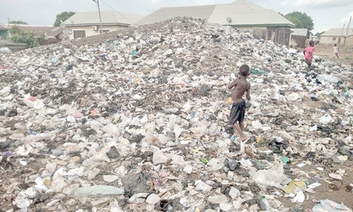 Some children playing at the dumpsite 