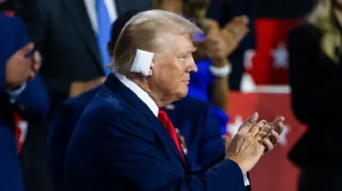 Bandaged Trump gets rapturous welcome two days after assassination attempt