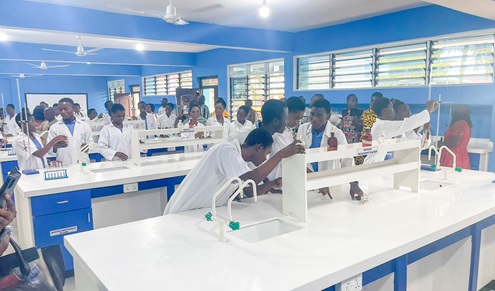Students performing an experiment at the refurbished laboratory