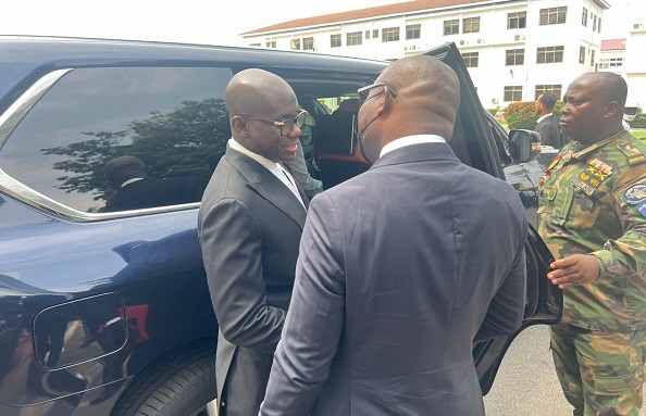 The Attorney -General and Minister of Justice, Godfred Yeboah Dame in a discussion with Richard Sky, one of the plaintiffs in the suit