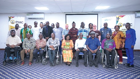 Emerita Prof. Elizabeth Ardayfio-Schandorf (seated 5th from left), with some board members of PIAC and members of Disability Organisations after the engagement