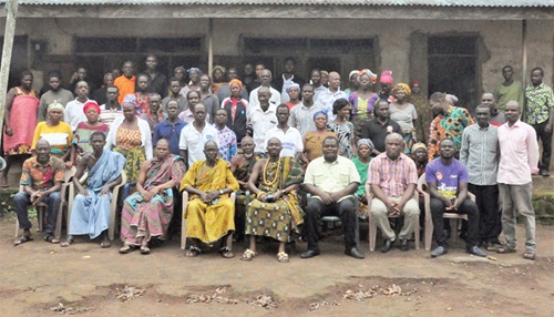  Ernest Victor Apau (seated, 3rd from right), Ho West DCE, with the chiefs and people of Kpoeta-Ashanti