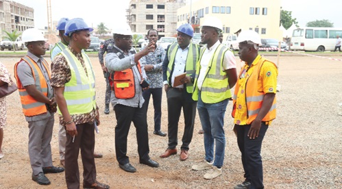 Martin Adjei-Mensah Korsah (2nd from left), Minister of Local Government, Decentralisation and Rural Development, interacting with Prof. Nicholas Awortwi (3rd from right), Director, Institute of Local Government Studies, and Jacob Nyameke (2nd from right), the Project Manager, during the inspection of the ongoing projects. Picture: ELVIS NII NOI DOWUONA 