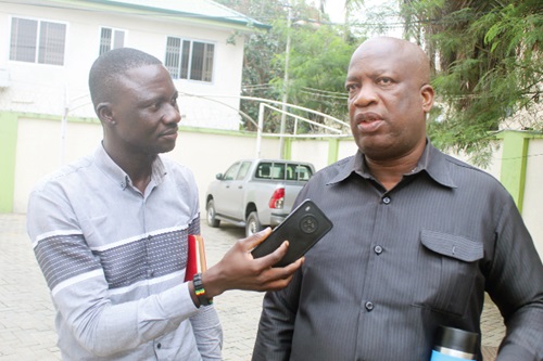 Dr Serebour Quaicoe (right), Director of Training, Electoral Commission, being interviewed by Timothy Ngnenbe, Reporter of the Daily Graphic. Picture: ESTHER ADJORKOR ADJEI