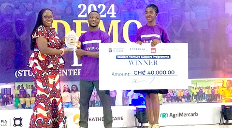 Prof. Nana Aba Appiah-Amfo (left), Vice-Chancellor of UG, presenting a plaque to Ecofibre Solutions team, the winners of the Student Venture Support Programme 2024 Demo Day Competition