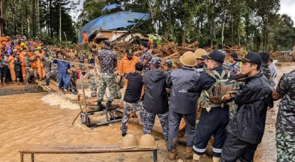 Army personnel used ropes to rappel across the river, which is in spate, to reach stranded villagers