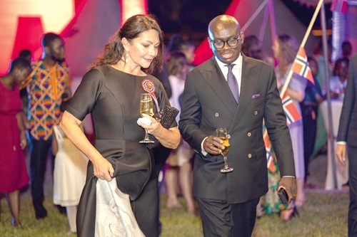  Ingrid Mollestad (left), the Norwegian Ambassador to Ghana, and Godfred Yeboah Dame, the Attorney-General, interacting after proposing a toast to the healthy ties between the two countries