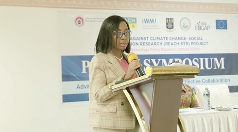  Prof. Marian Dorcas Quain (inset), Deputy Director-General, Council for Scientific and Industrial Research, addressing participants in the symposium Prof. Marian Dorcas Quain (inset), Deputy Director-General, Council for Scientific and Industrial Research, addressing participants in the symposium