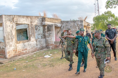  Kwame Asuah Takyi (left), Comptroller-General of Immigration, being conducted around during a visit to one of the installations in the north