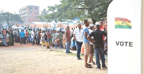 Some members of the electorate in a queue waiting to cast their vote in one of the general elections
