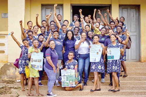 Juliana Ama Kplorfia (arrowed), Executive Director, Girls Excellence Movement, with her staff and some students of Ghanata Senior High School, after an educational campaign  